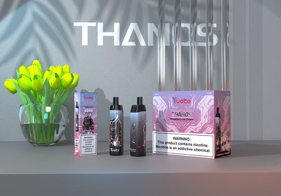 Desechable Vape Pod 5000 Puffs Banana Flavor Yuoto Thanos Mesh Coil 14ml Ejuice 650mAh Batería que aumenta el volumen Fábrica de China